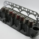 Cylinder head - new, complete (begin E-11001)