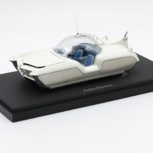 White futuristic car model on black display base with blue cockpit, labeled Astra Gnome on the base
